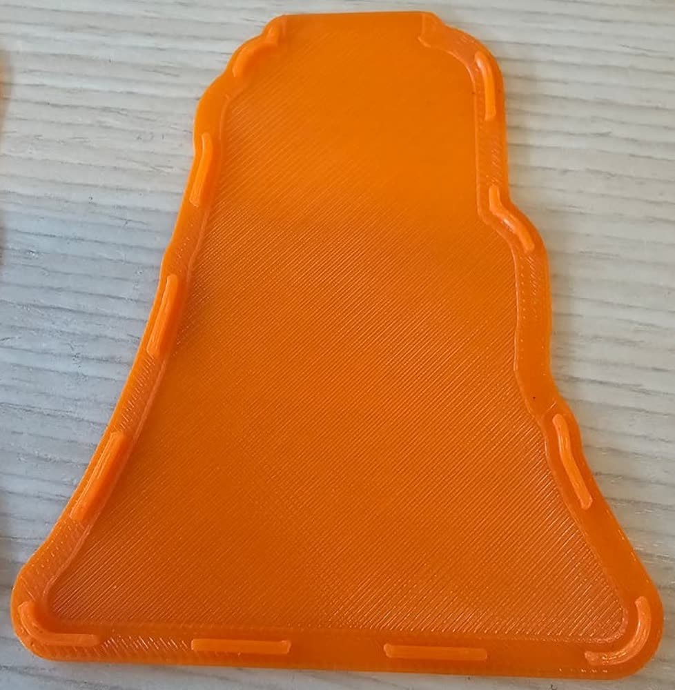 The bottom piece with its recess and rib slots.