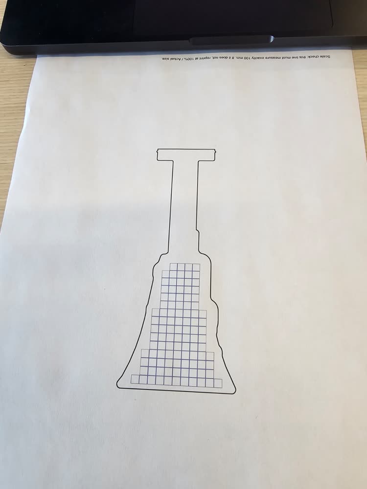 The printed 1:1 PDF with the board outline and taxel grid.